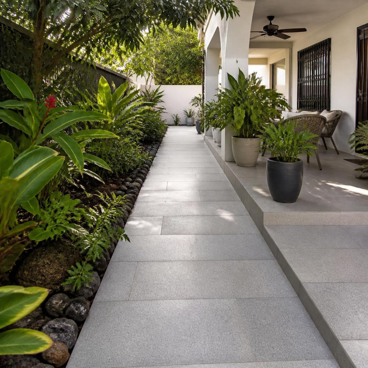 Baldosa de concreto 20x40x4 cm — terraza y andador de una vivienda