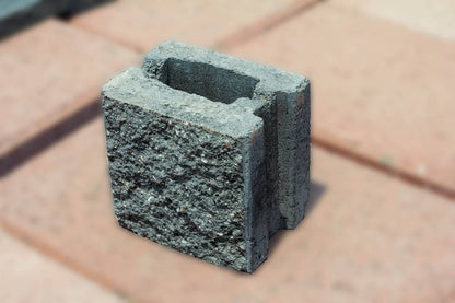 Dado de concreto 15x20x20 cm — foto de referencia del fabricante (línea de fachada, gris)