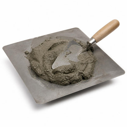 Mortero premezclado Holcim para albañilería — mortero gris sobre tabla de mezcla, imagen de referencia